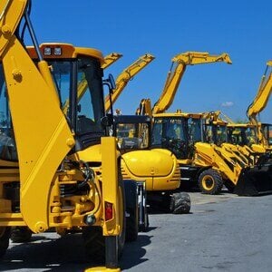 https://www.greatamerica.com/hubfs/iStock-157293468-yellow-backhoes-2-1.jpeg